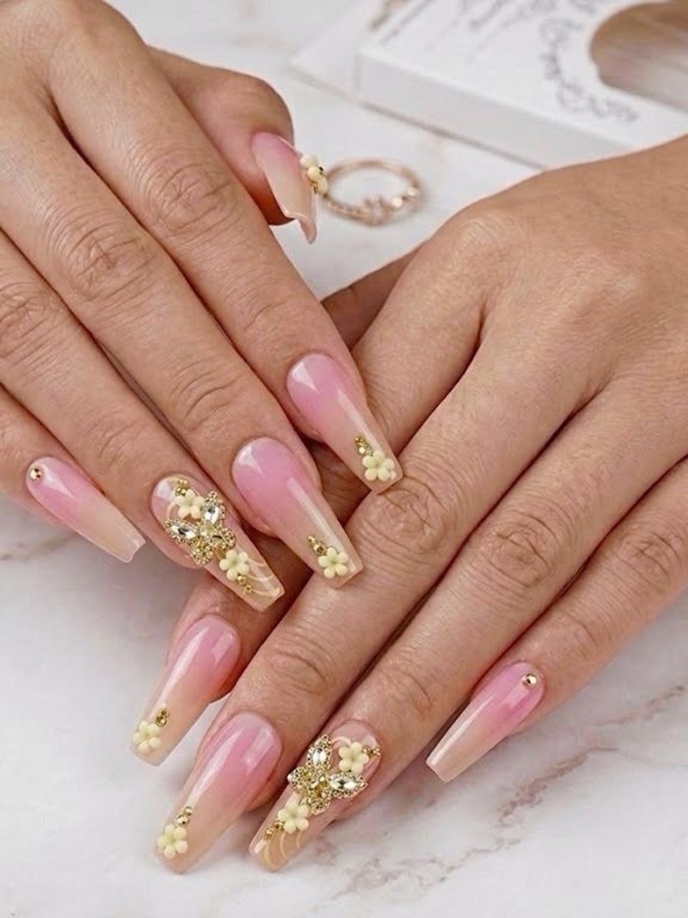 Delicate Pink Ombre Nail Set with Gold and Cream Floral Accents